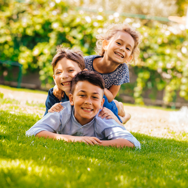 Children Playing in the Grass